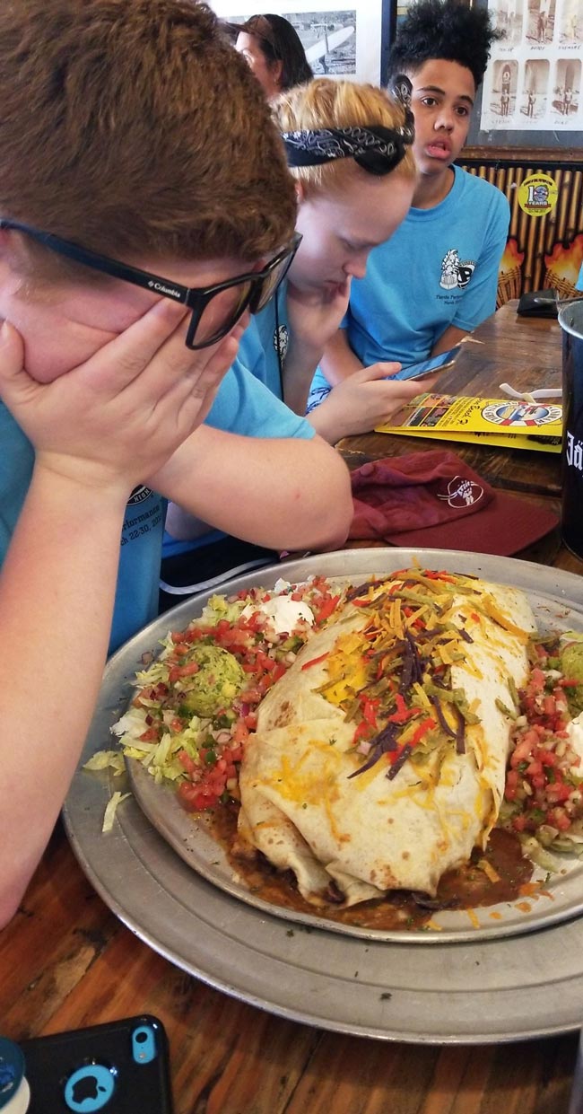 "5 lbs. isn't that much, I can definitely eat this burrito" he said, looking at the menu confidently. Oh how wrong he was