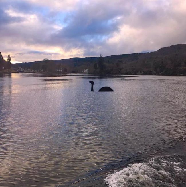 Scottish tour boats on Loch Ness have window decals so everyone can spot Nessie