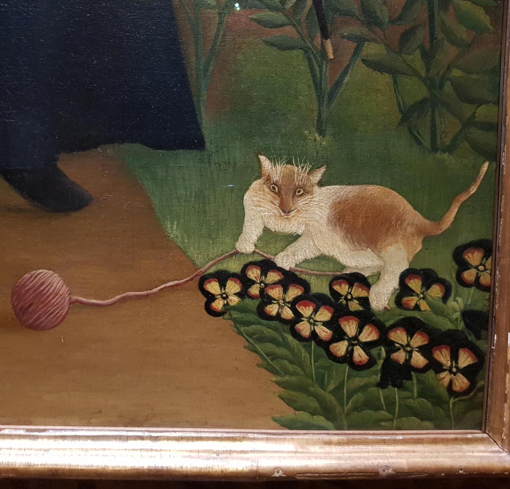 The cat in this painting