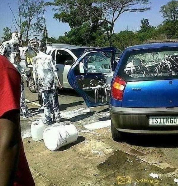 Just hold the paint, it's not far. What could go wrong?