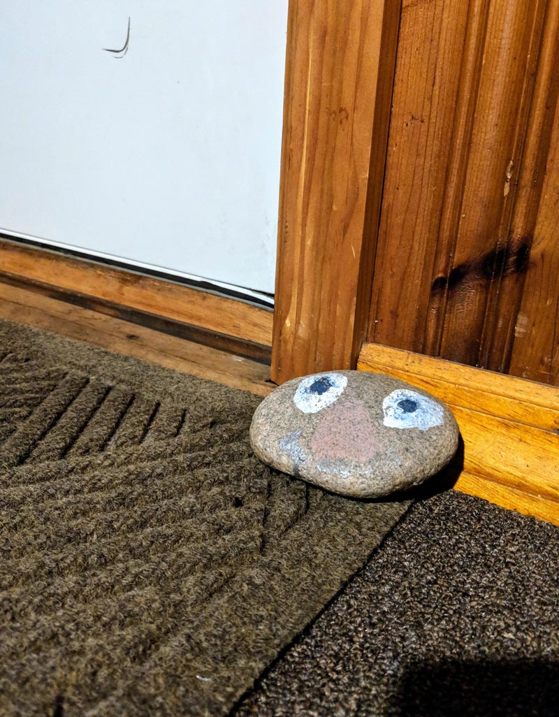 30+ years ago my big bro painted this rock to act as a guardian at my bedroom door to keep me safe from nightmares. Now it guards the front door of my house