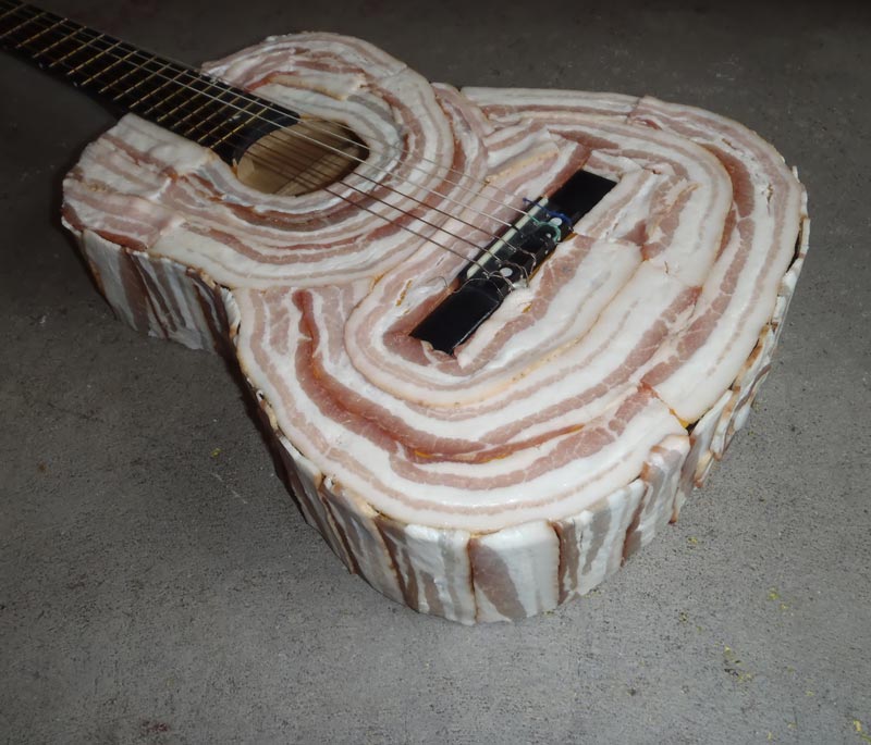 Is this Kevin Bacon's guitar or Kevin's bacon guitar