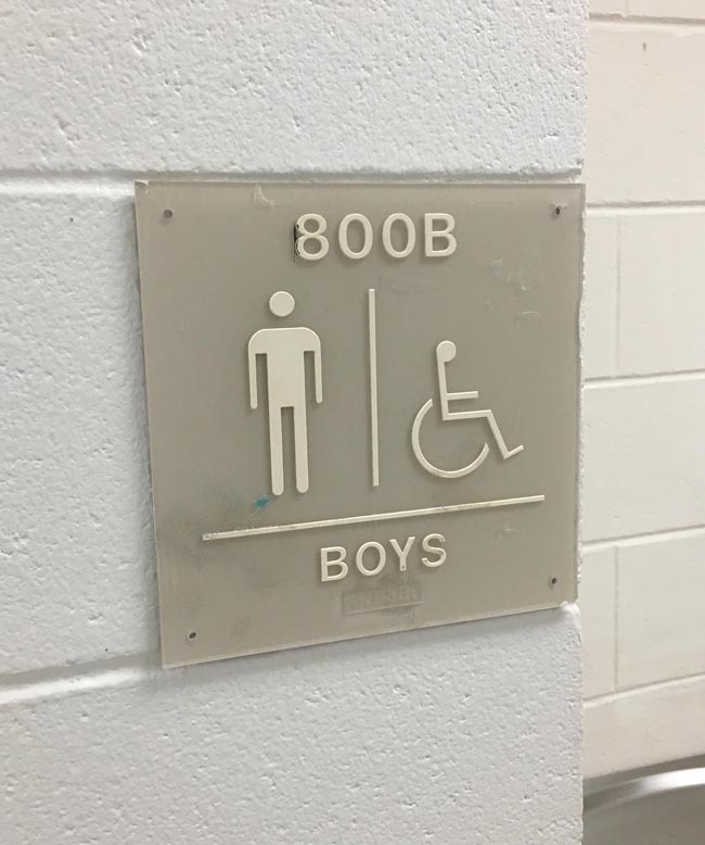 Quality room numbering on the boys’ bathroom at the local high school