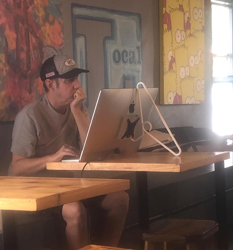 Guy at coffee shop shows off his solution to the $999 Apple stand