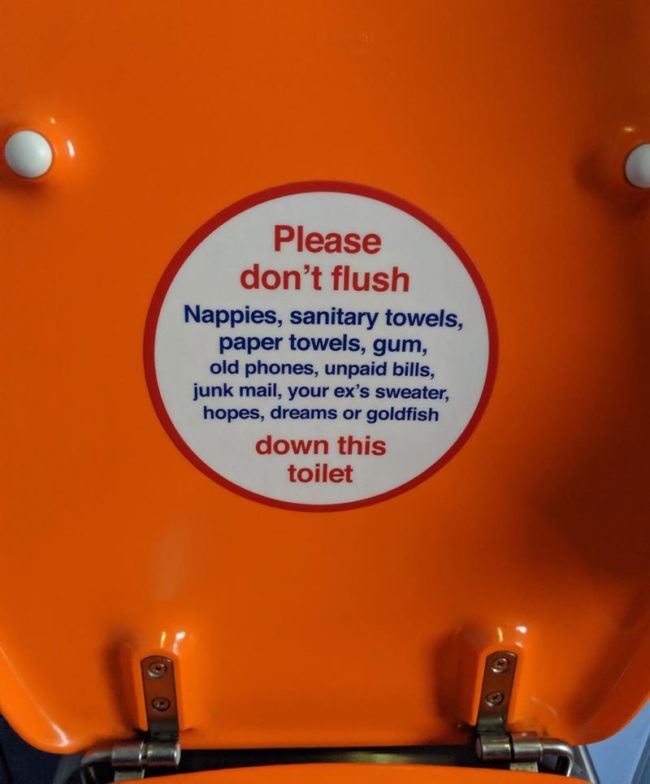 Sticker on a train toilet heading to London