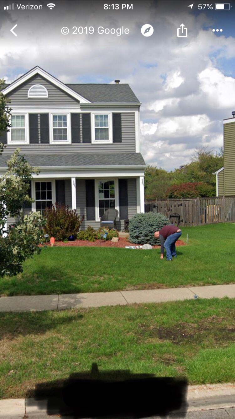 Doing yard work outside my home, completely oblivious to the Google street-view camera car rolling by and exposing my crack to the world