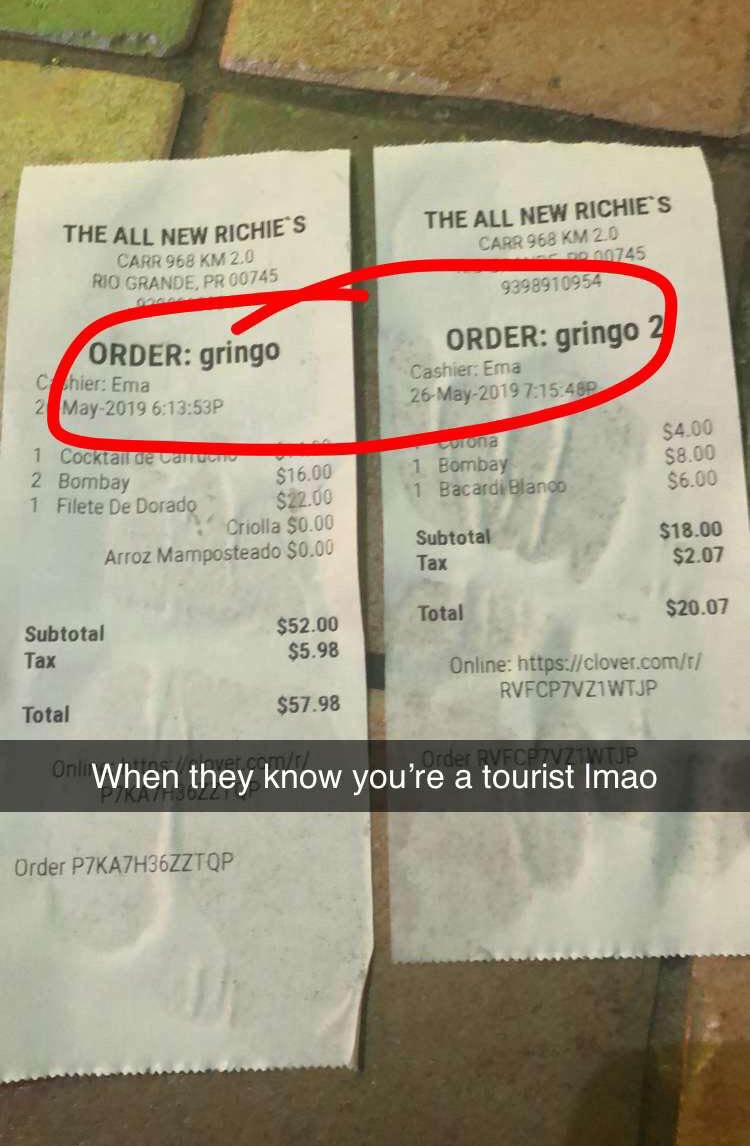 My buddy's and my receipts from a restaurant in Puerto Rico. I love this island