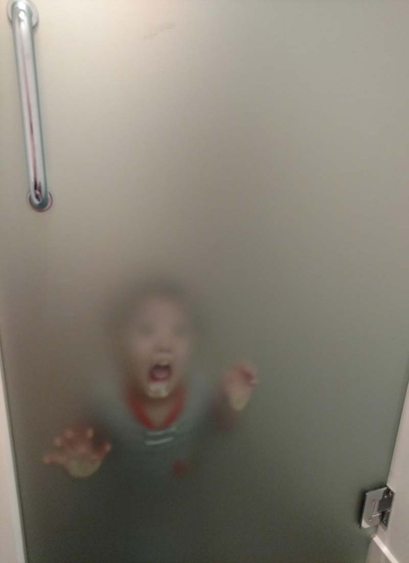 I sat on the toilet, closed the door, and my 2 year-old decided I wasn't pooping fast enough
