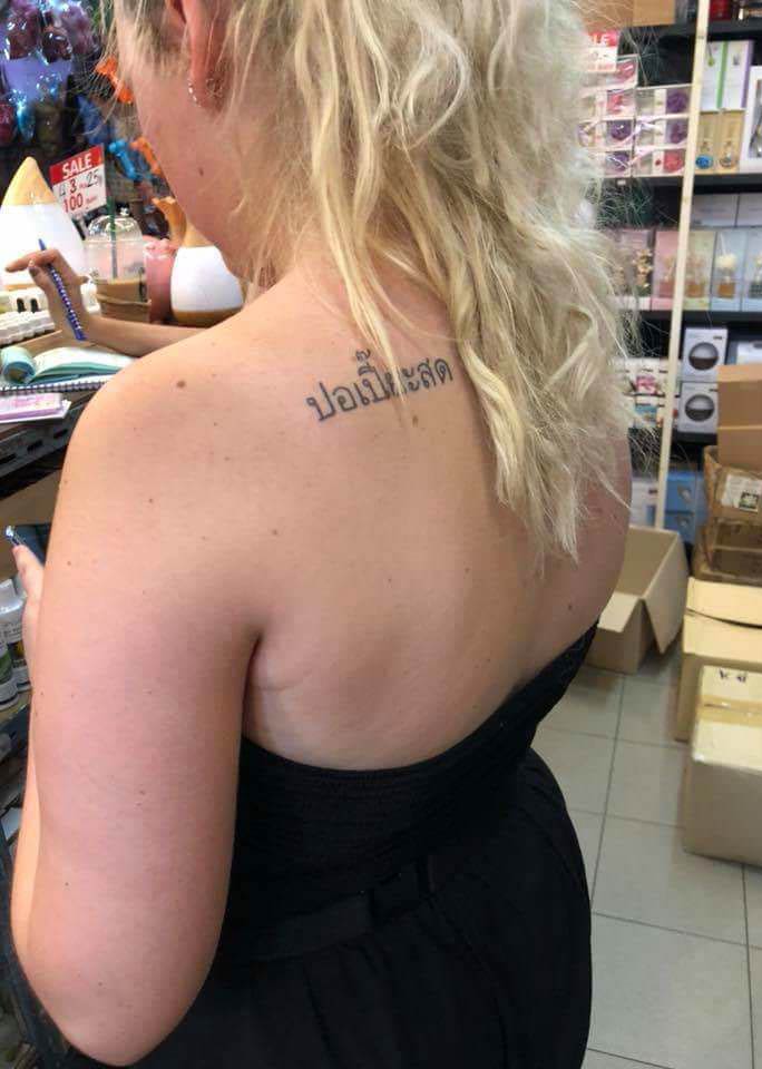 Her tattoo says fresh spring rolls in Thai