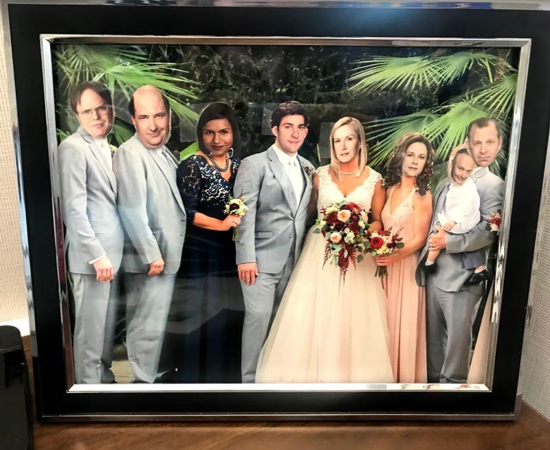 Coworker has a picture of his sister's wedding on his desk. We did this to it