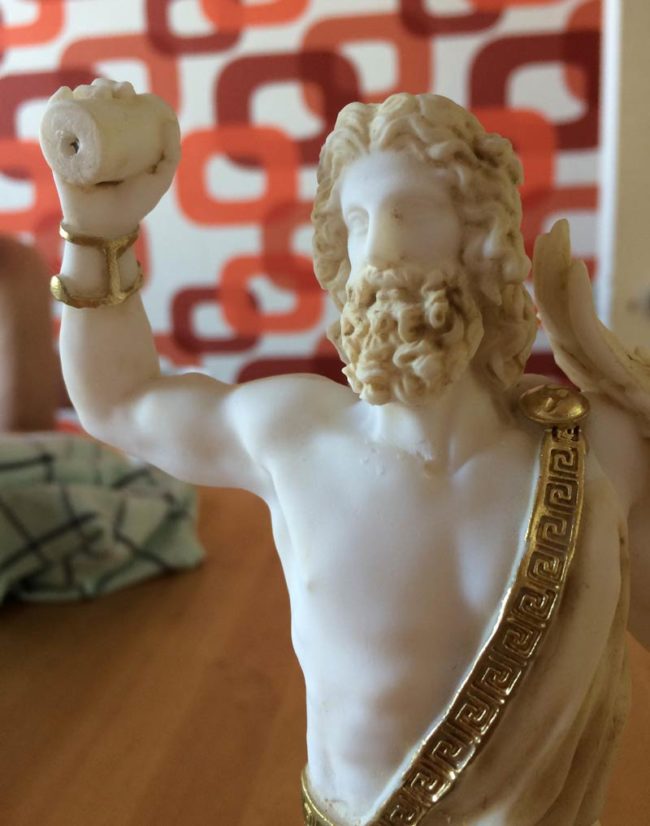 My statue of Zeus broke and now it looks like he's throwing a roll of toilet paper at someone