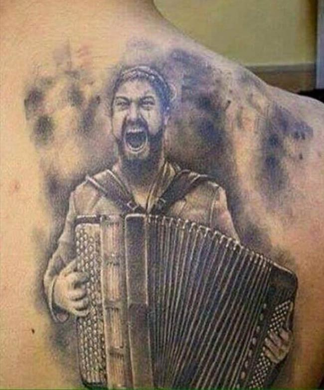 At the tattoo parlor: "I like 300 and folklore music." Tattoo artist: "Say no more."