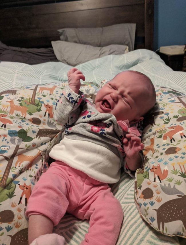 My week old daughter shredding a sick air guitar solo