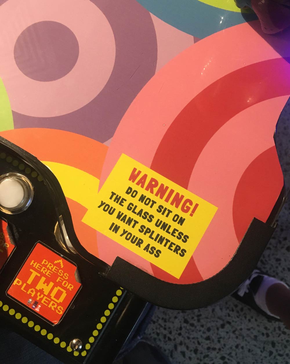 Warning sticker at this arcade