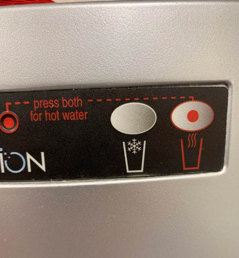 The water dispensing machine at work has two choices: snow or bacon