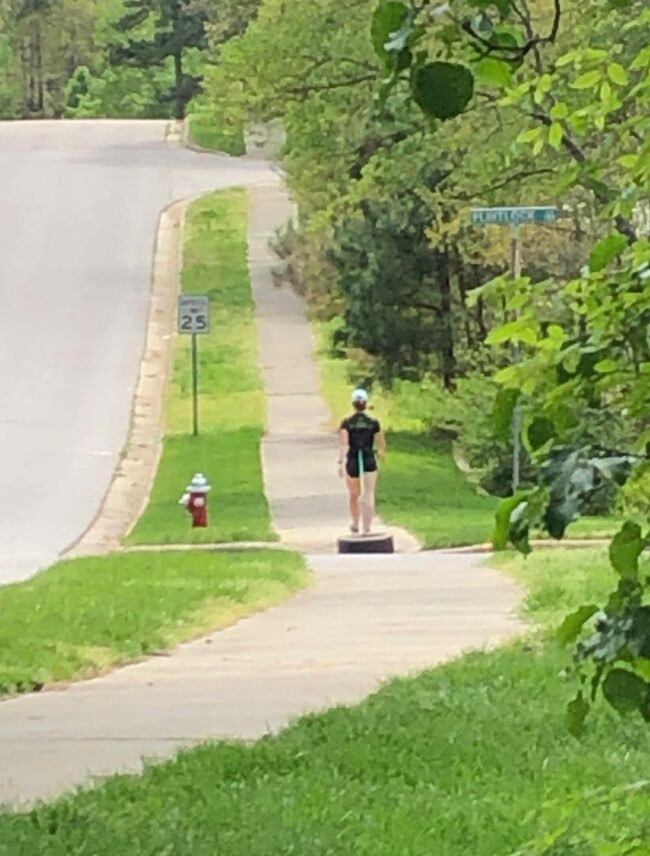 Woman walking with her emotional support tire