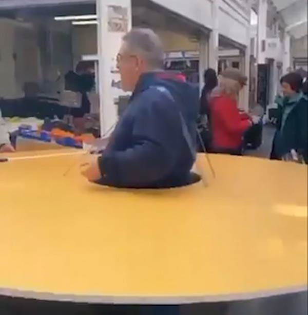 This guy in Italy wearing a 1m radial disc to avoid contact with people
