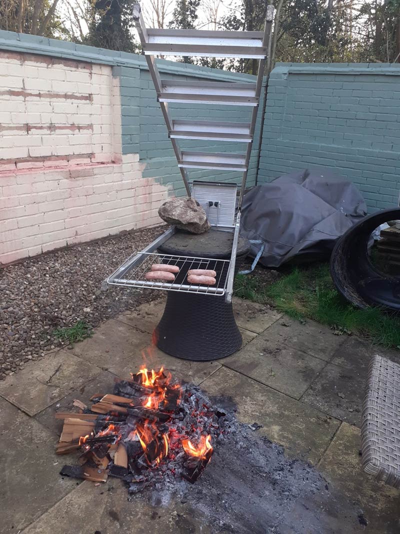 My resourceful friend made a makeshift BBQ out of a ladder!