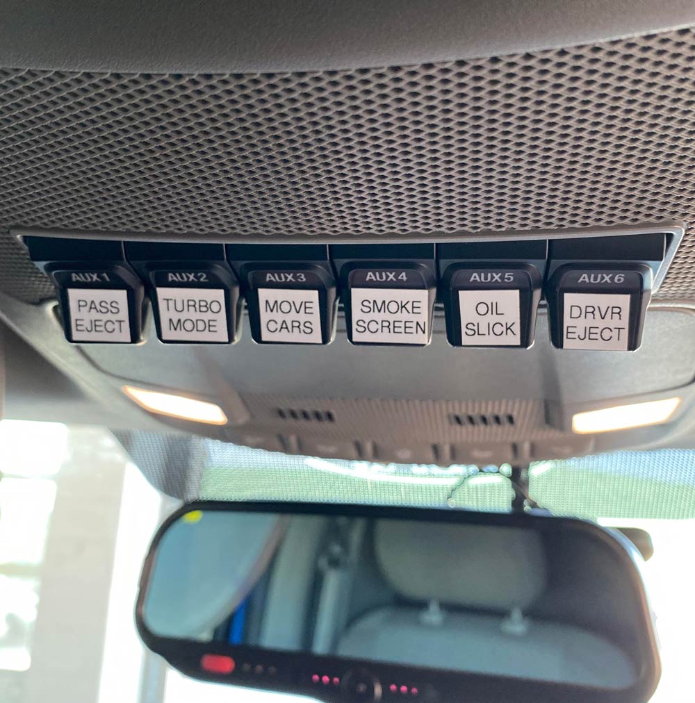 Coworker labeled the useless auxiliary switches in the ambulance