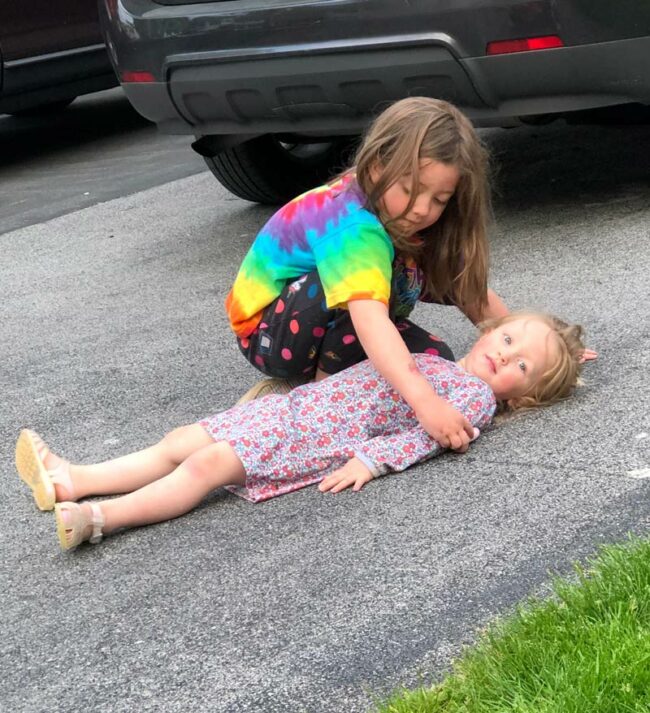 My daughters wanted to play with chalk outside. I came out to them setting up a fake crime scene