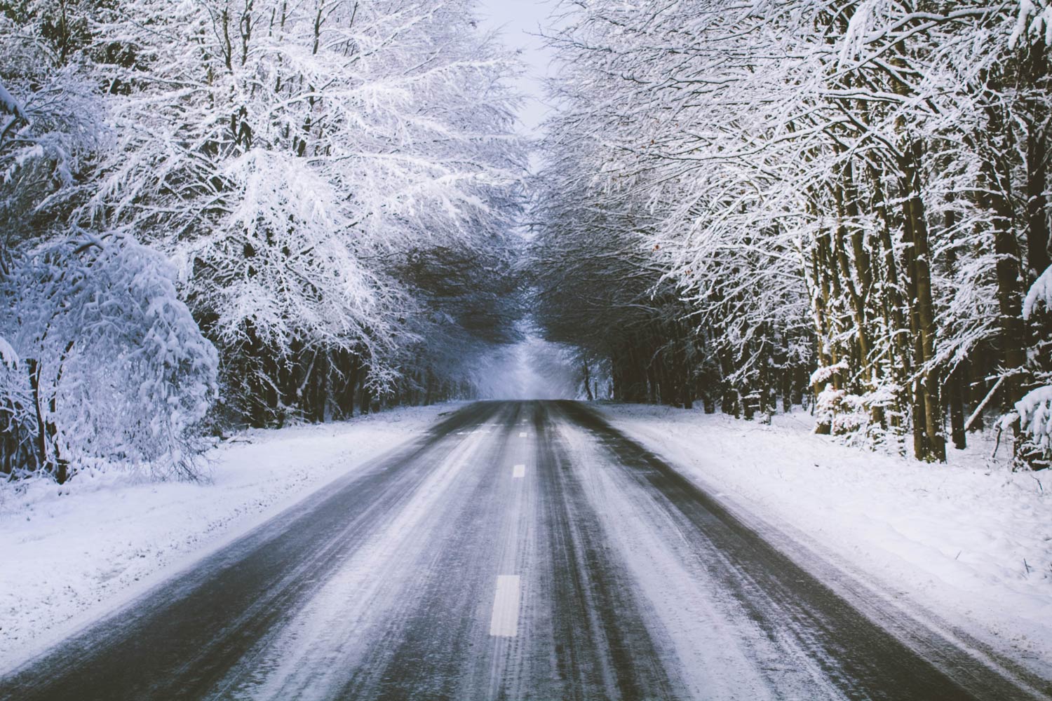 Snowy road in Longfaye, Belgium
