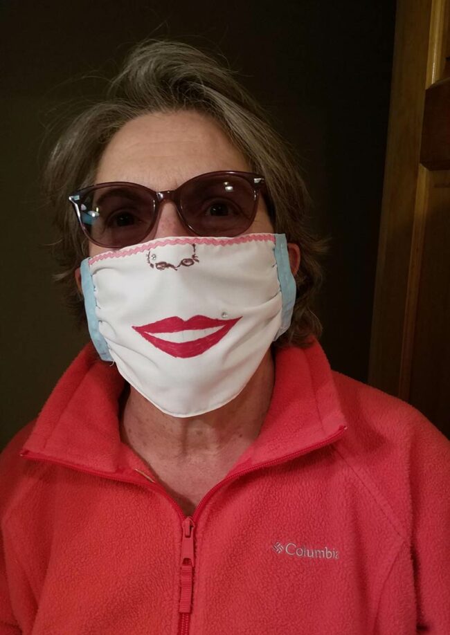 My Grandmother gave herself a nose piercing & lip piercing on the mask she made