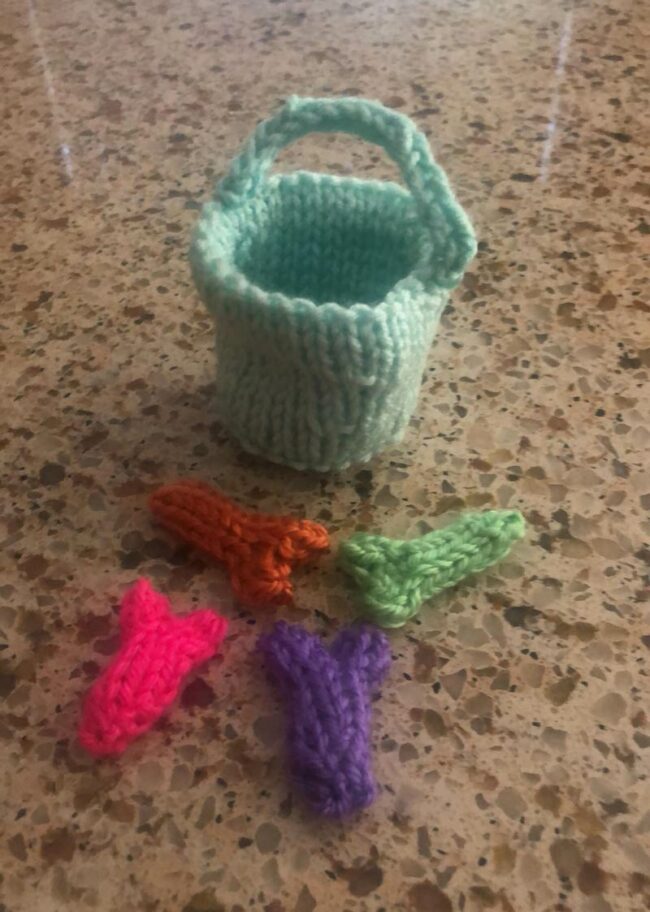 To cheer me up during stay-at-home, my friend knitted me this little bucket of dicks