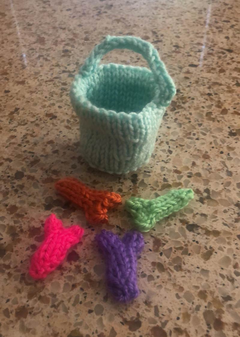 To cheer me up during stay-at-home, my friend knitted me this little bucket of dicks