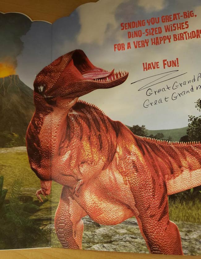 My nephew removed the top of the trex's head on his birthday card