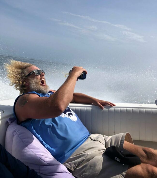 My buddy trying to drink a beer on the high seas.
