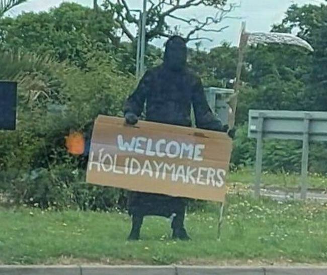 The Grim Reaper 'welcoming' tourists in Devon, England