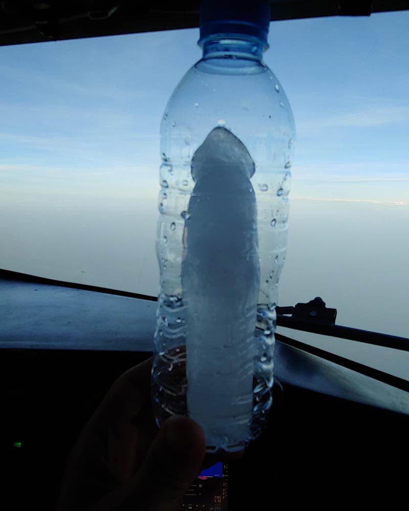 Froze a water bottle for the insanely hot preflight on my deployment, ended up with this after takeoff