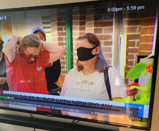 This woman wearing a mask on the local news