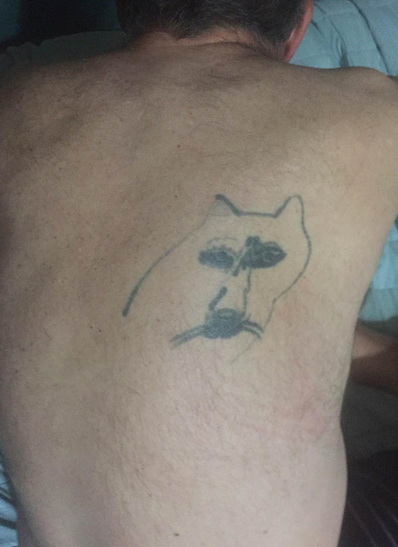 My Coworker might have one of the worst tattoos of all time. The years haven't been kind to it