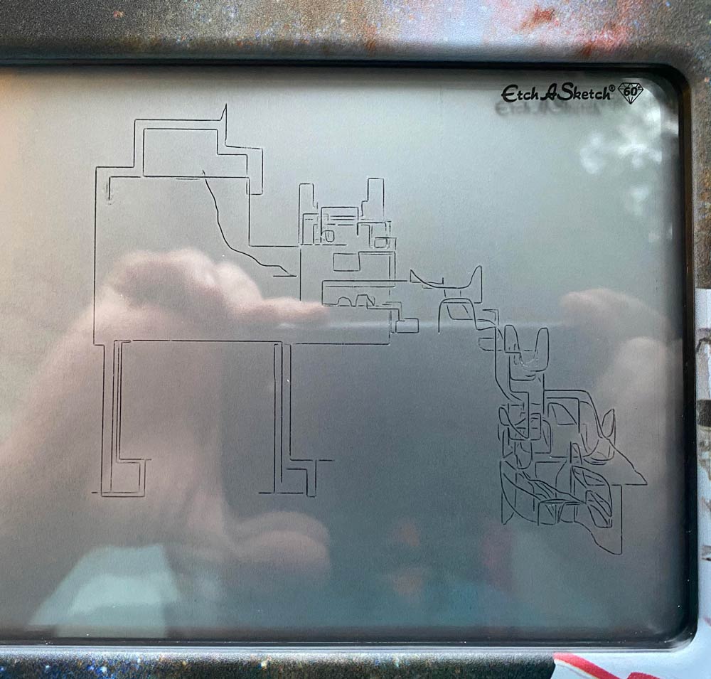My daughter got an etch a sketch today for her 8th birthday. She drew a cat puking