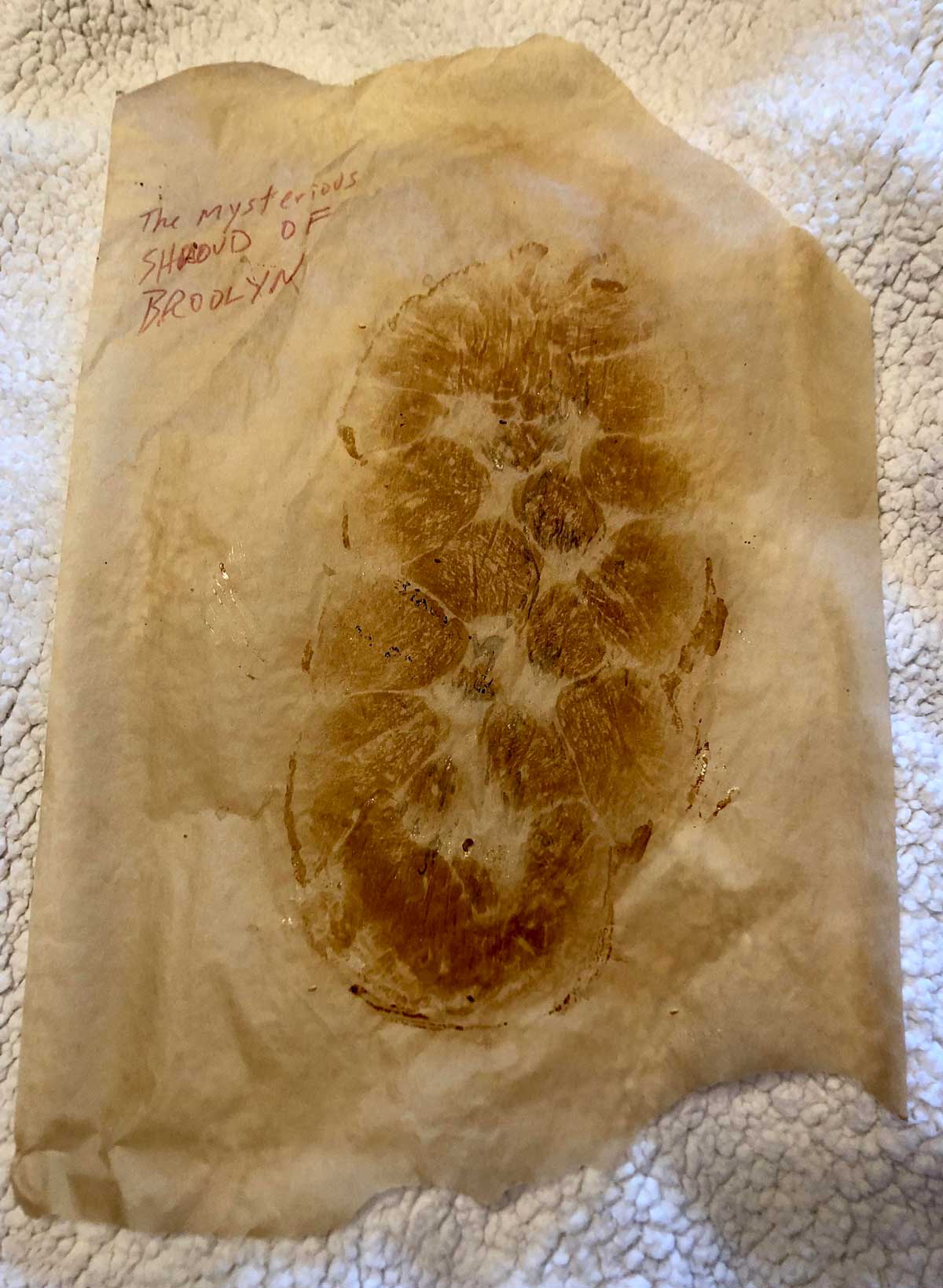 I baked a Challah and it stained the parchment paper. My dad wrote a caption on it