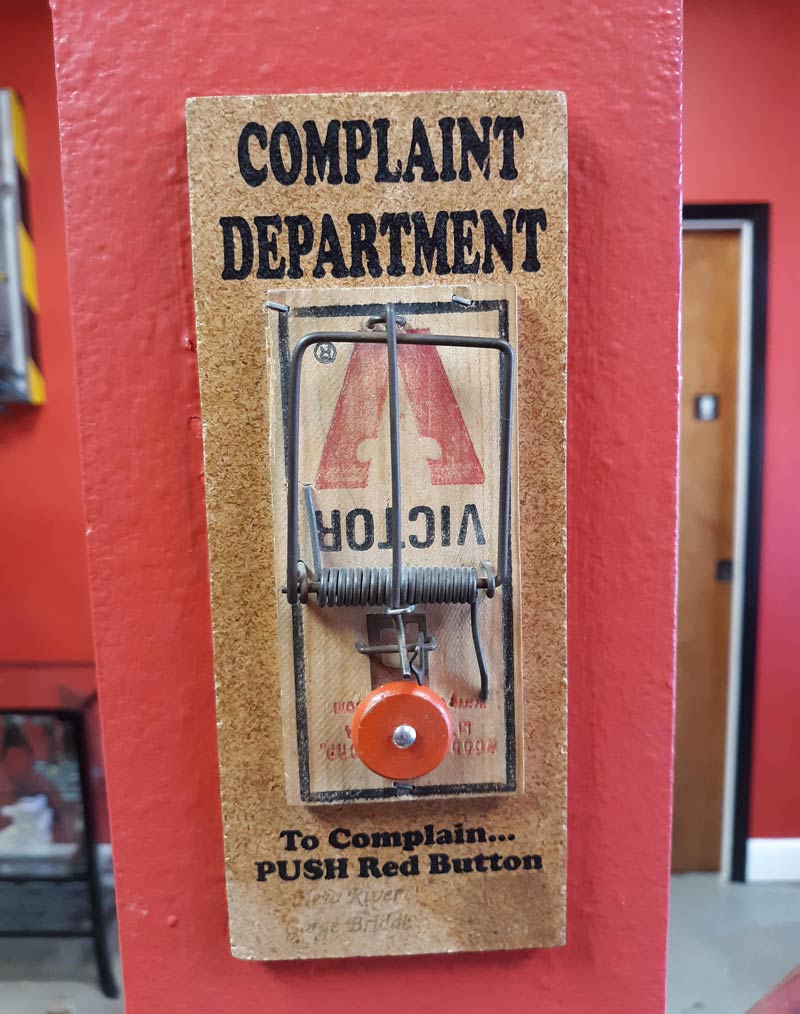 Complaint department button at a local tattoo parlor