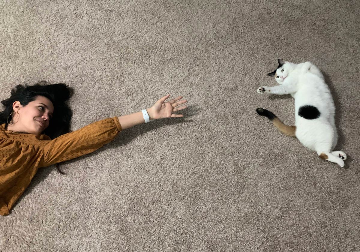 Captured this modern Renaissance scene of my fiancée and cat in my living room today