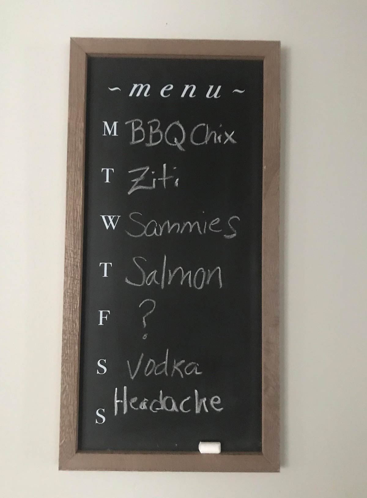 My mom's menu board in the kitchen