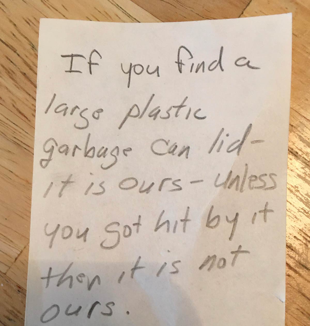 A note our neighbors left us after a very windy day