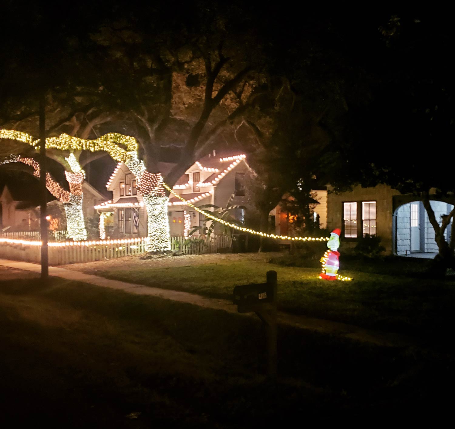 After I bought this house I was informed my neighbors do it big for Christmas. I spent a lot of money already buying a new tree and all the decorations for the inside, so I talked to my neighbor and we came up with the perfect solution. I promise I'm not really a grinch!