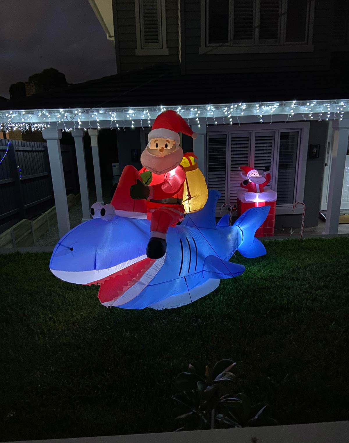 n Australia Santa delivers presents on a shark..