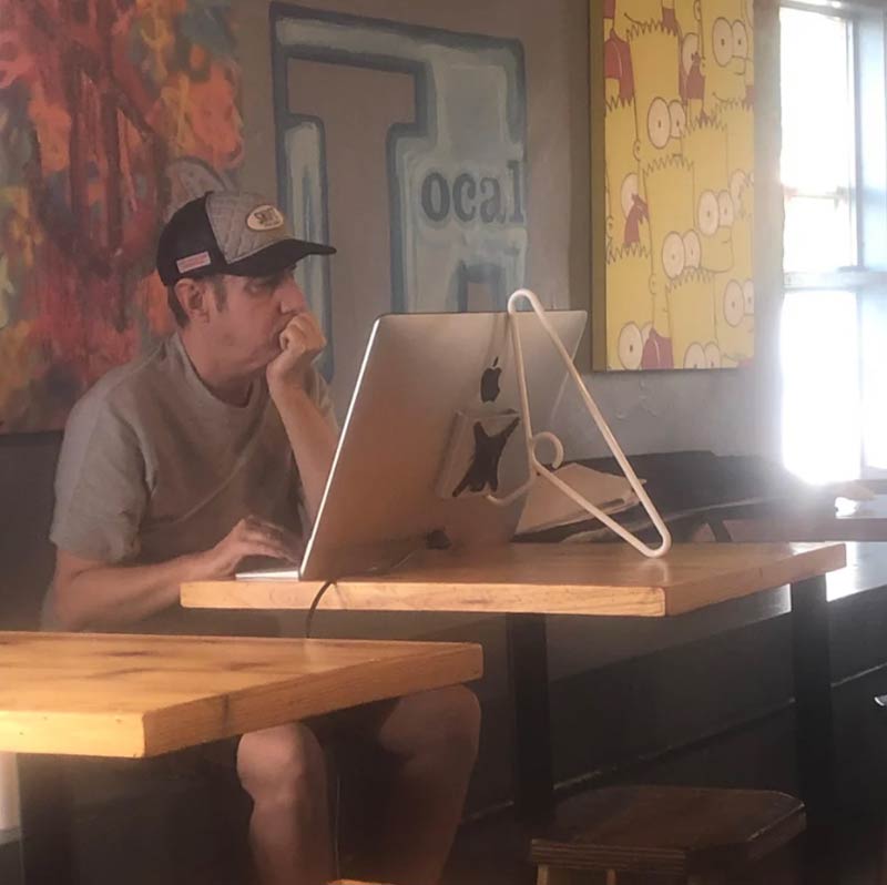 Guy at coffee shop shows off his solution to the $999 Apple stand