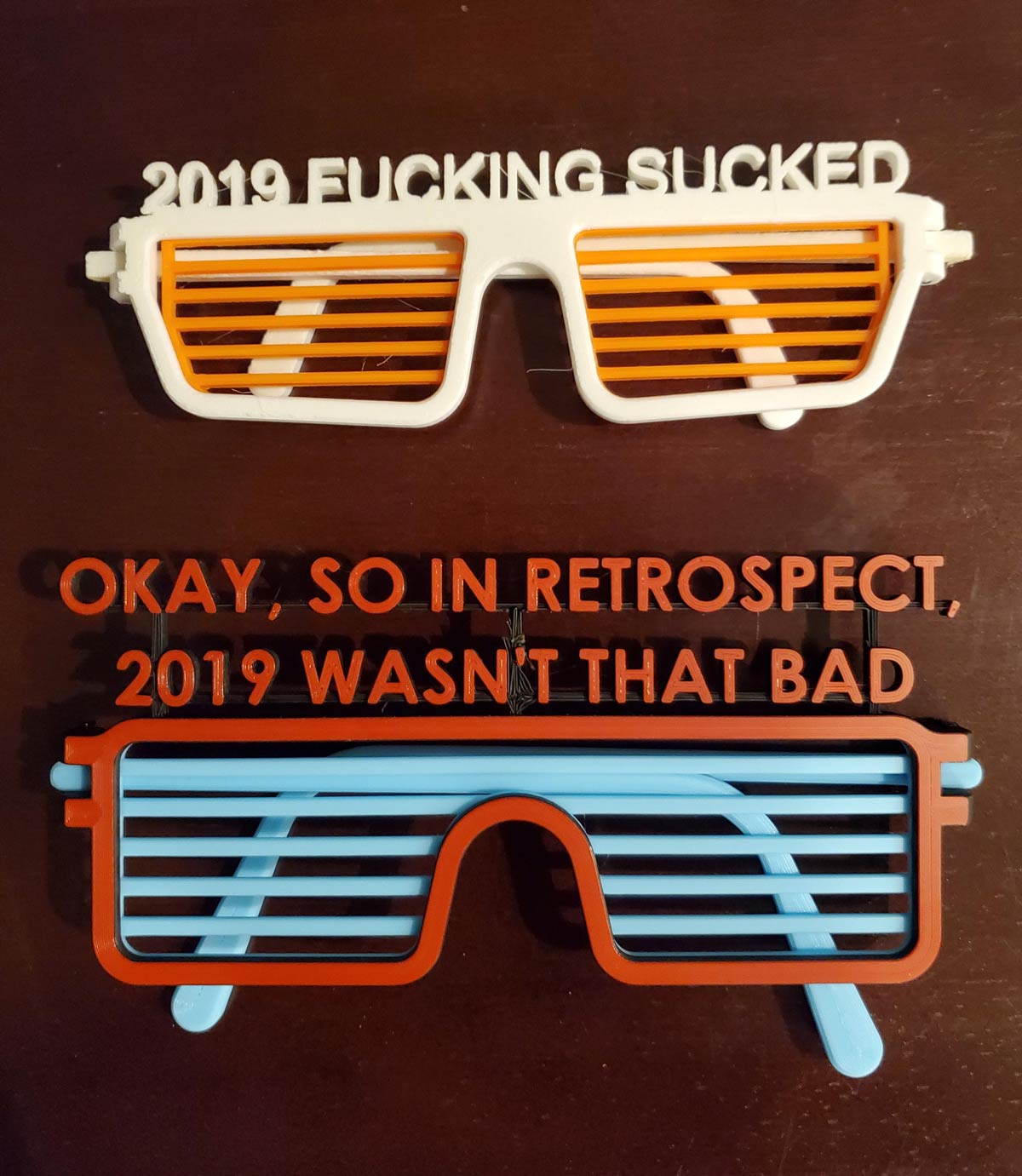 Behold! My friend makes glasses each year for his New Year's get together. 2019 edition vs 2020 edition