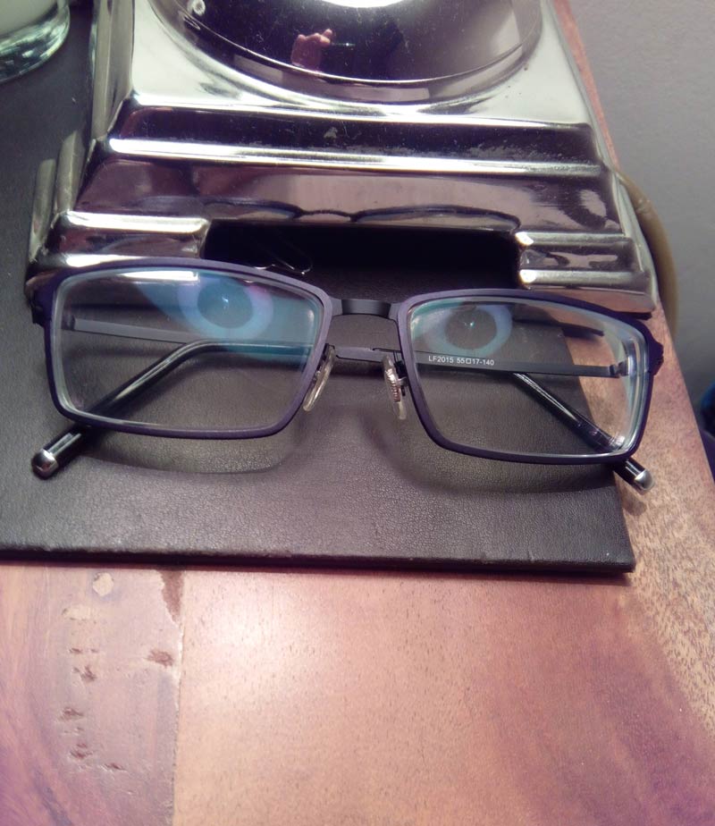 Felt like I was being watched. Realised it was the reflection of the lamp in my specs..