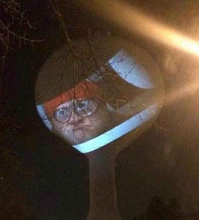Neighbor projecting Trailer Park Boys onto the water tower