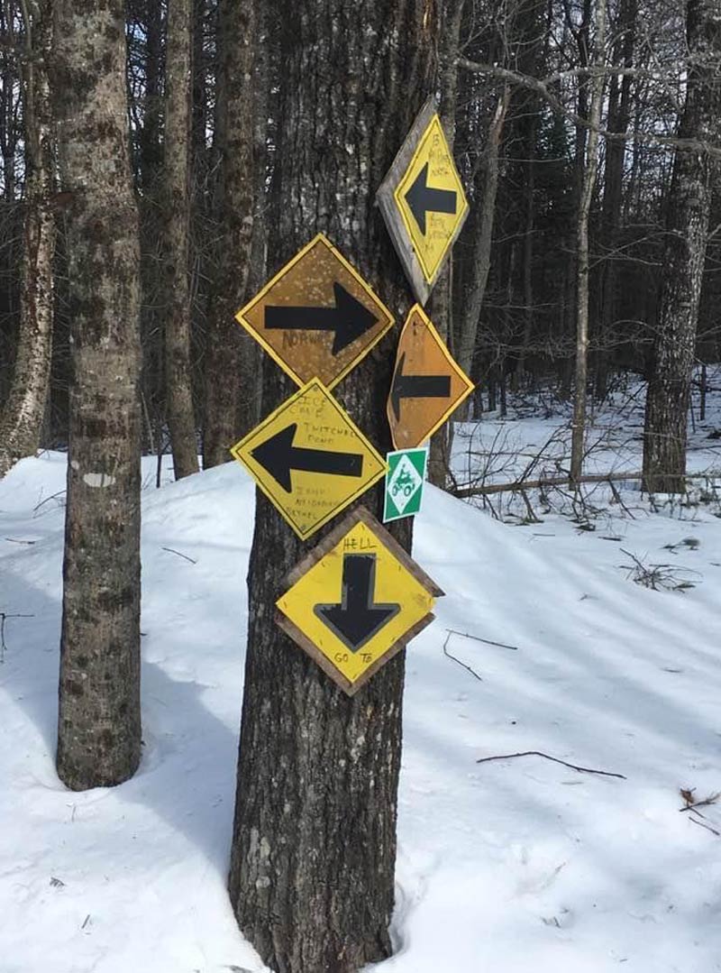 Snowmobiling in Maine.. Just follow the trail signs, they said
