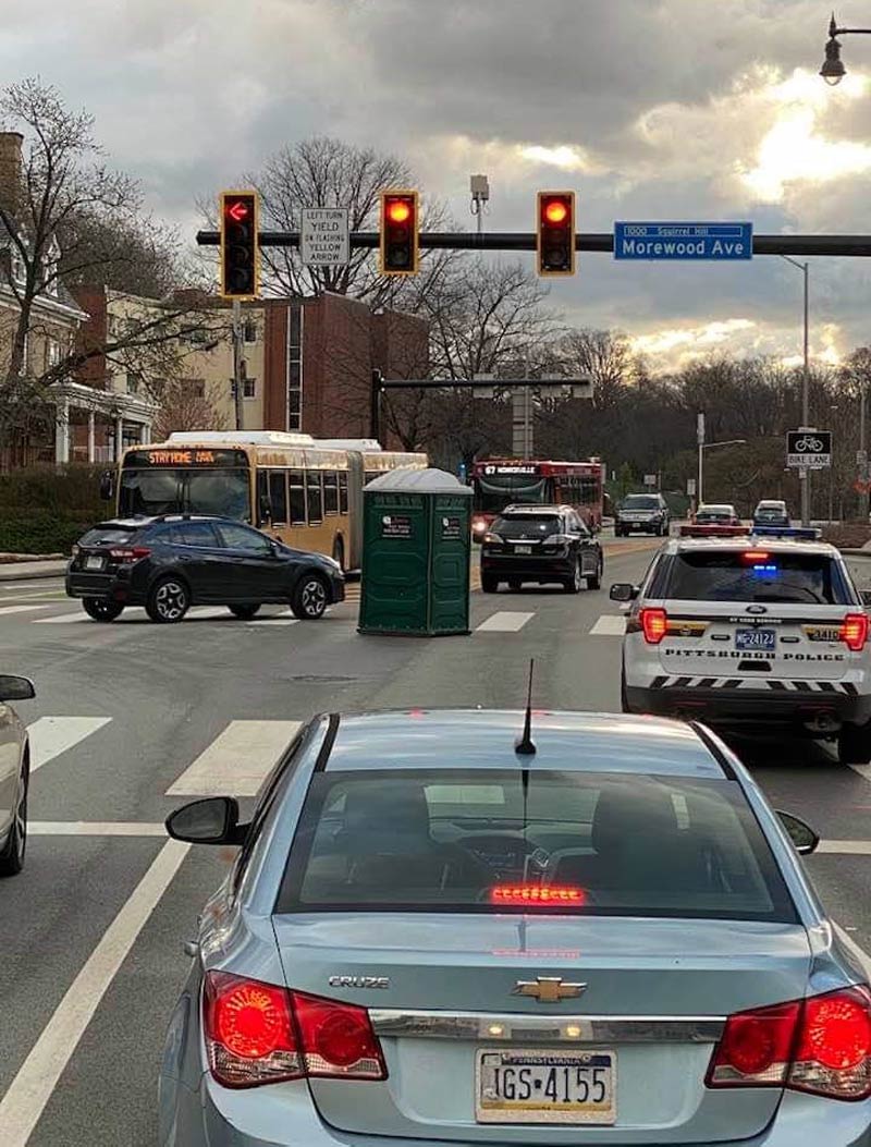 A wind storm blew a porto-potty into an intersection in Pittsburgh, PA today..