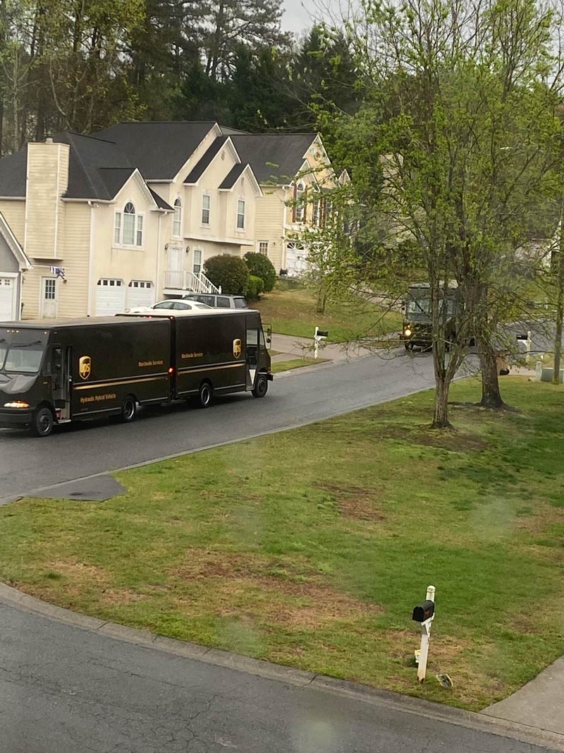 Spring is in the air! Behold the rarely photographed mating ritual of the UPS truck