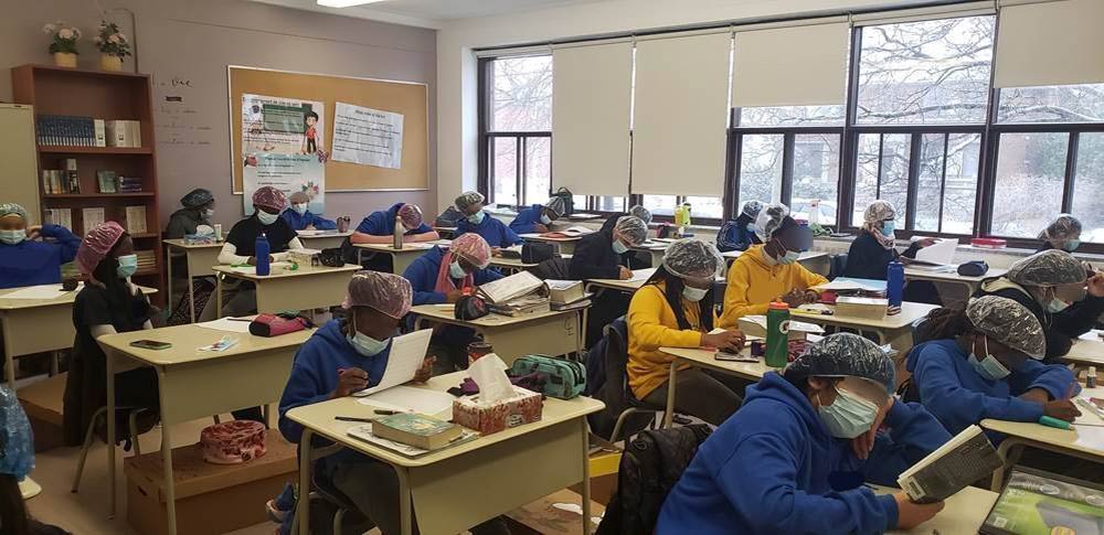 For April Fools, a teacher told her class that the government imposed the wearing of shower caps as an extra safety measure